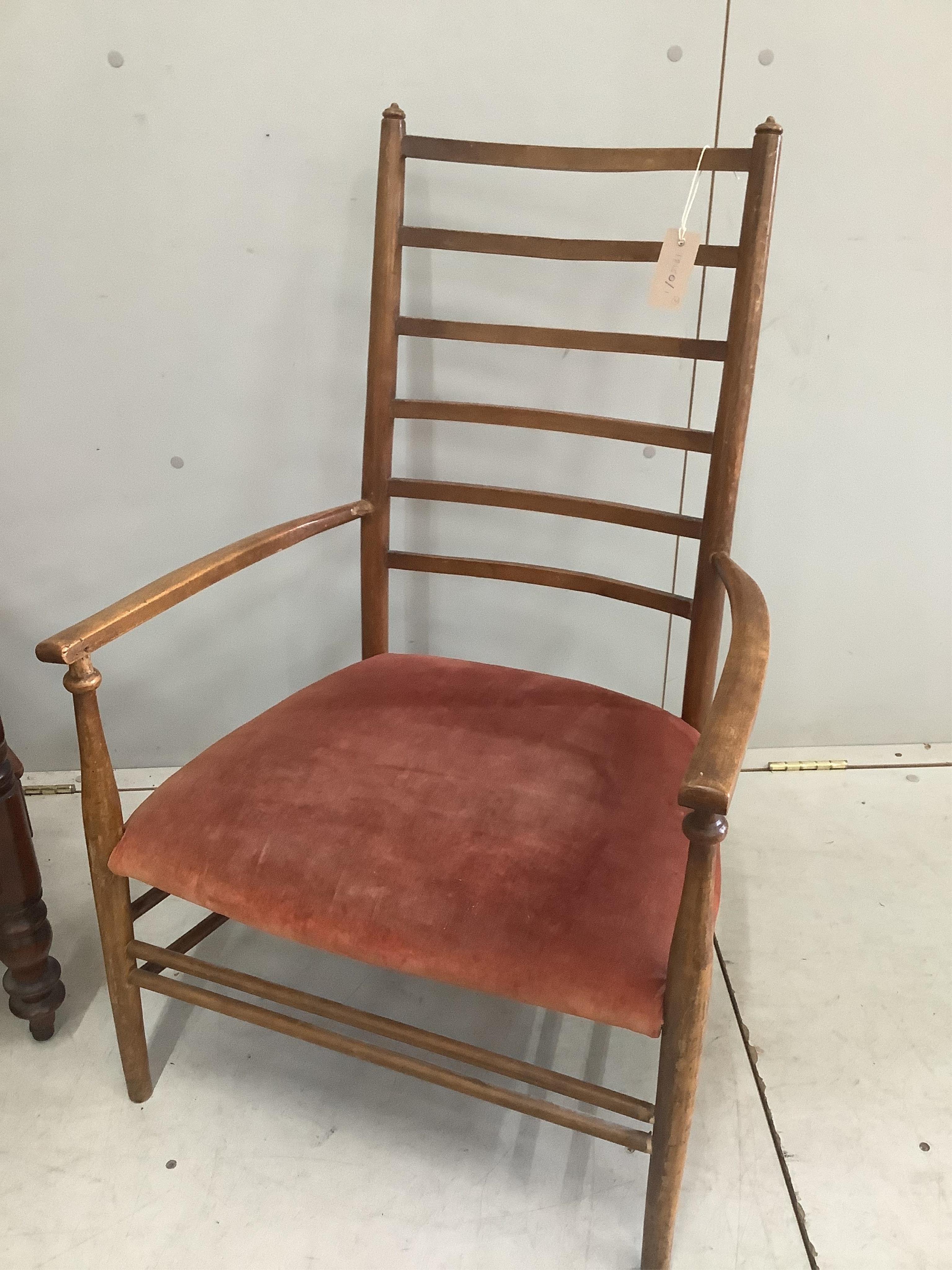 A Victorian Provincial mahogany ladderback armchair, height 107cm, together with an Arts & Crafts mahogany ladderback chair
